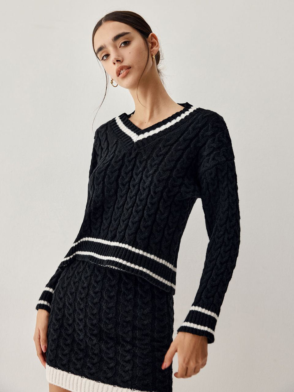 Zopfmuster-Pullover mit Rock